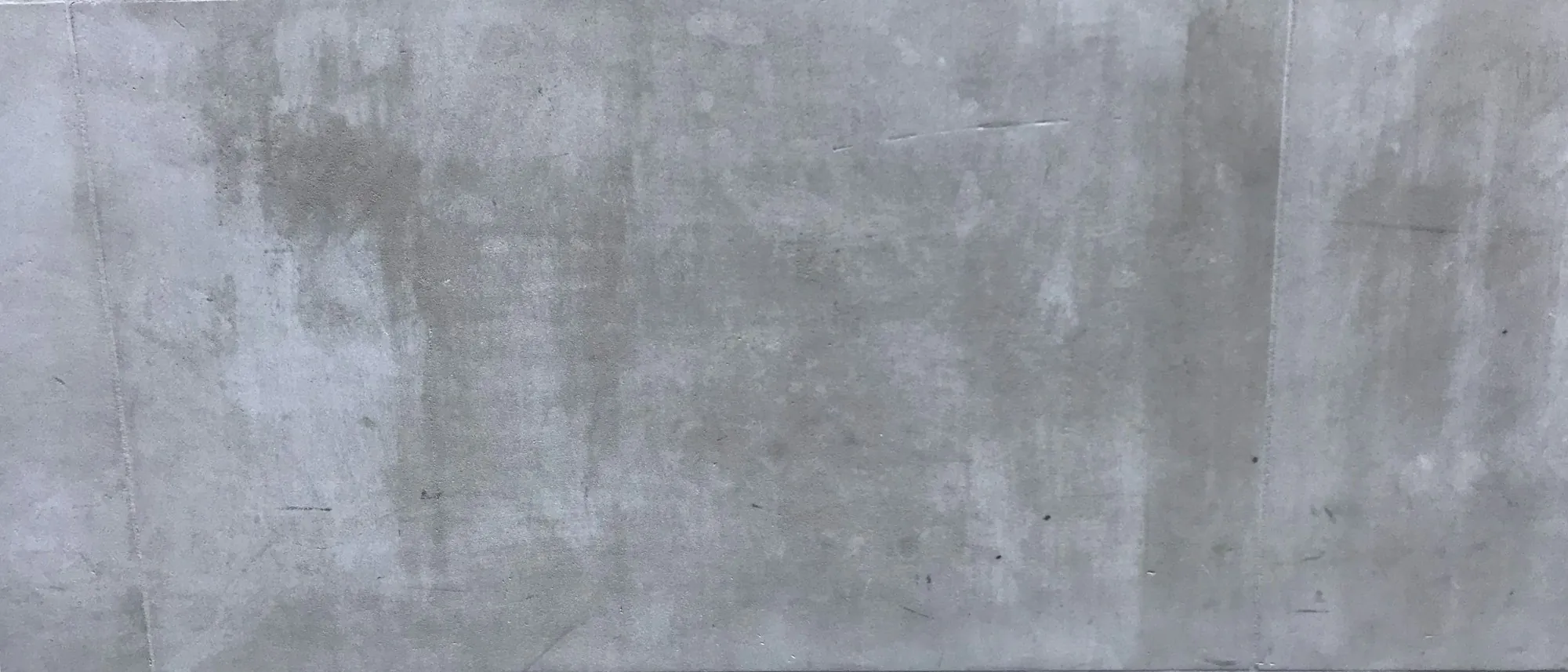 Dark gray smooth concrete surface